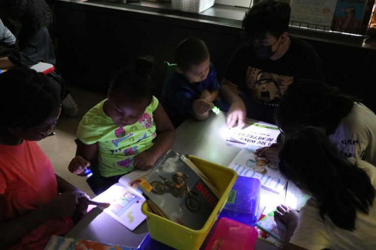 Vails Gate Students Read in the Dark